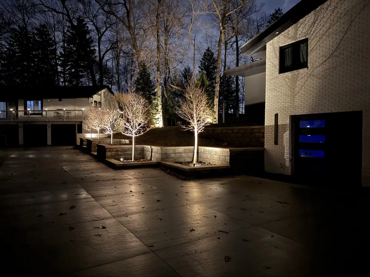 Landscape tree uplighting with paver patio in Oakland County